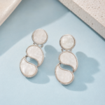 ivory pearl swirl statement earring